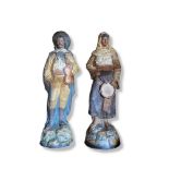 A PAIR OF 19TH CENTURY CONTINENTAL TERRACOTTA FIGURES MODELLED AS GYPSY MUSICIANS In period