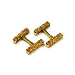 TIFFANY & CO., A PAIR OF VINTAGE 18CT GOLD CUFFLINKS Having rectangular mounts with textured finish,