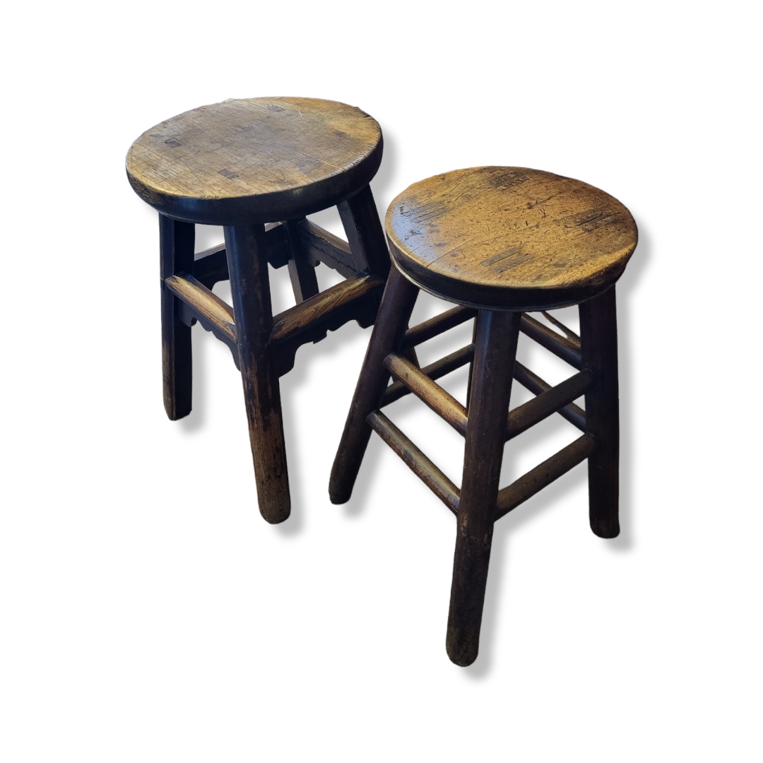 A PAIR OF LATE 19TH/EARLY 20TH CENTURY CIRCULAR CHINESE HARDWOOD STOOLS On four turned legs, one