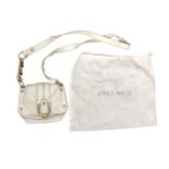 COCCINELLE, A VINTAGE ITALIAN WHITE LEATHER BAG Having part gilt and leather strap and associated