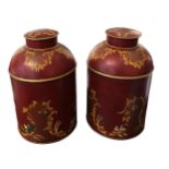 A LARGE PAIR OF CHINESE STYLE TOLEWARE TEA CANISTERS. (h 26.5cm x diameter 23cm)