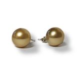 A PAIR OF WHITE METAL AND PEARL EARRINGS The single pearl with stud back. (pearl approx diameter 1.