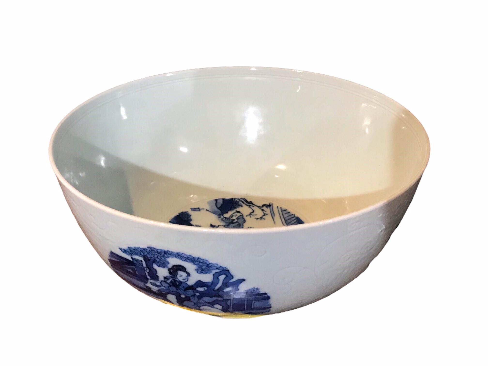 A LARGE CHINESE BLUE AND WHITE BOWL Exterior showing a lady performing different activities with