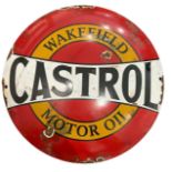 A CIRCULAR ENAMEL CASTROL MOTOR OIL SIGN. (diameter 29cm)