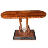 AN ART DECO DESIGN ROSEWOOD CONSOLE TABLE With central shell finial decoration. (h 81.5cm x d 43cm x