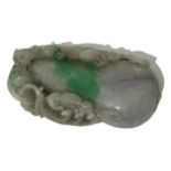 AN ORIENTAL STYLE CARVED JADEITE PAPERWEIGHT Depicting a pear and beast. (8.5cm x 4.7cm x 1.8cm)