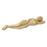 AN ORIENTAL STYLE RECUMBENT NUDE FIGURE. (length 13cm x h 2cm x depth 3cm)