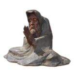 A LARGE BRONZE SCULPTURE, A BEARDED MAN PRAYING. (h 32cm x w 47cm)