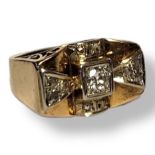 A VINTAGE 18CT GOLD AND DIAMOND COCKTAIL RING The central round cut diamond edged with diamonds in a