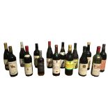 A COLLECTION OF FIFTEEN VARIOUS VINTAGE 1980’S AND LATER BOTTLES OF RED AND WHITE WINE.