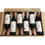 TWELVE BOTTLES OF VINTAGE CH TEAU TOUR ST. BONNET MEDOC, FRANCE, 1982 In original cardboard dispatch