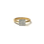 AN 18CT GOLD AND SQUARE CUT DIAMOND CLUSTER RING. (UK ring size M½, gross weight 3.6g)