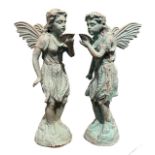 A PAIR OF A DECORATIVE GARDEN CAST IRON WINGED ANGELS. (h 50cm)