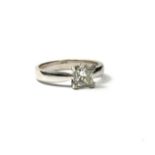 AN 18CT WHITE GOLD AND SQUARE CUT DIAMOND SOLITAIRE RING. (UK ring size M, gross weight 4.2g)