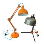 AN ORANGE ANGLEPOISE STYLE ADJUSTABLE LAMP Together with an industrial style bench lamp. (largest