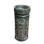 AN ORIENTAL GREEN JADEITE BRUSH POT Depicting dragons, character marks and flowers, marked to