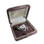MIKIMOTO, TOKYO, A BOXED VINTAGE SILVER AND PEARL BROOCH Naturalistic form, consisting of seven