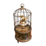 A VICTORIAN STYLE BIRDCAGE CLOCK. (h 19cm x diameter 9cm)