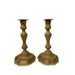 A PAIR 19TH CENTURY OF LOUIS XV STYLE GILT ORMOLU BALUSTER CANDLESTICKS Having detachable nozzles