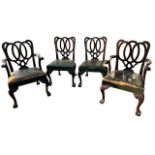 A SET OF FOUR LATE 19TH CENTURY GEORGE III DESIGN CARVED MAHOGANY DINING CHAIRS The shaped backs