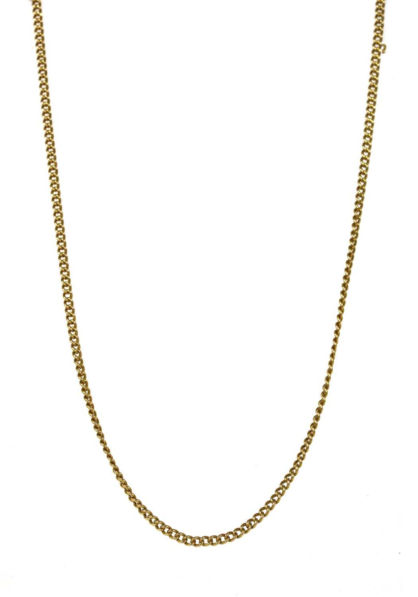 A gold curb link chain,
