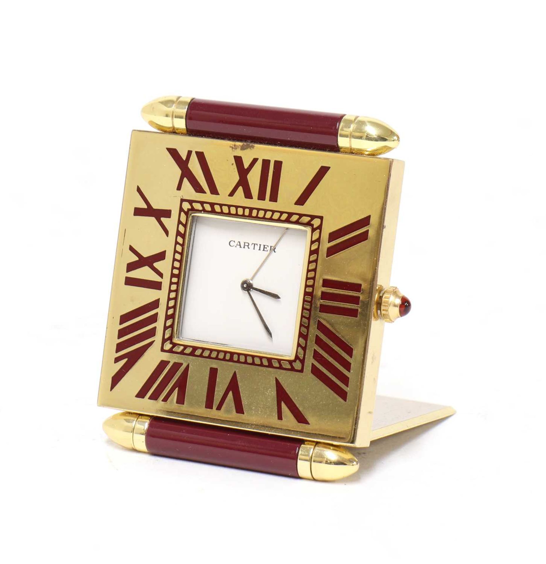 A Cartier 'Quadrant' folding travel alarm clock,