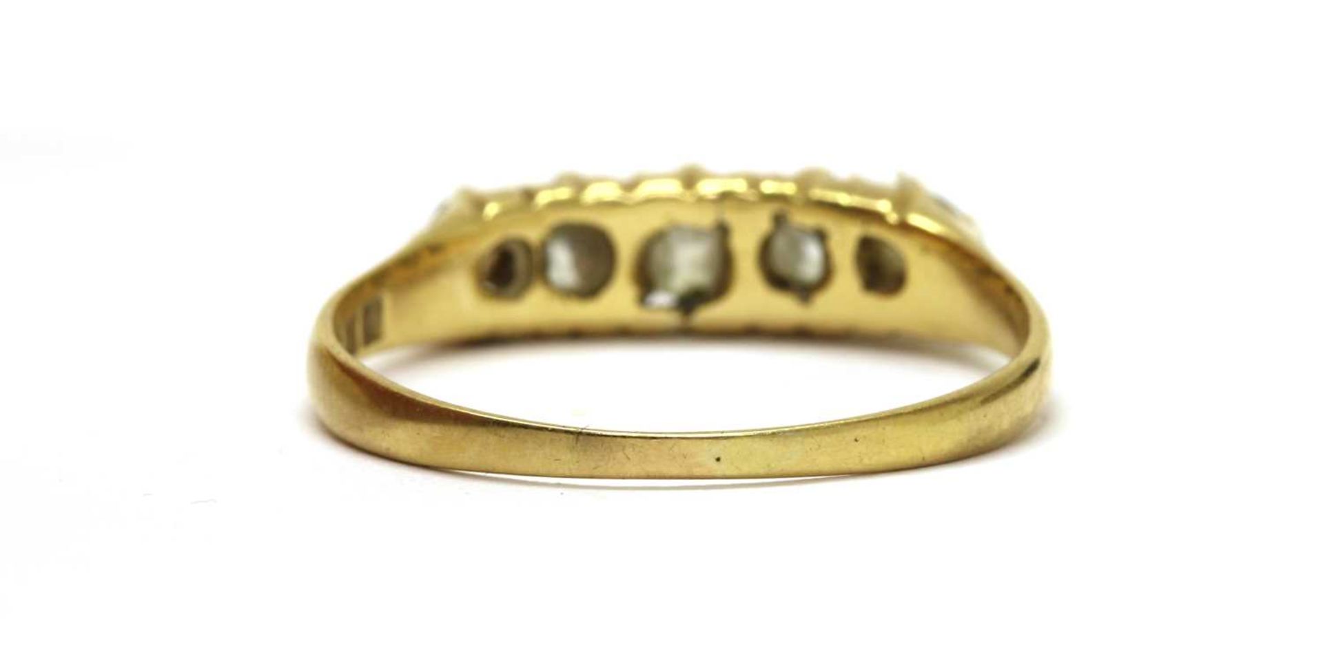 An 18ct gold five stone diamond ring, - Bild 2 aus 2
