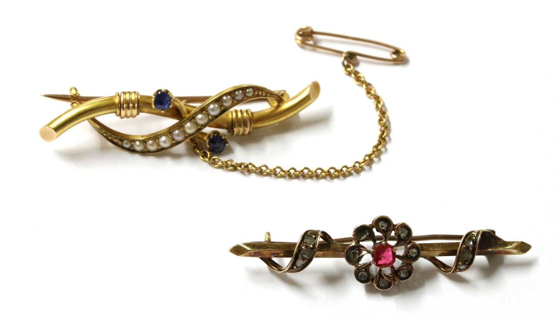 A gold sapphire and split pearl brooch,