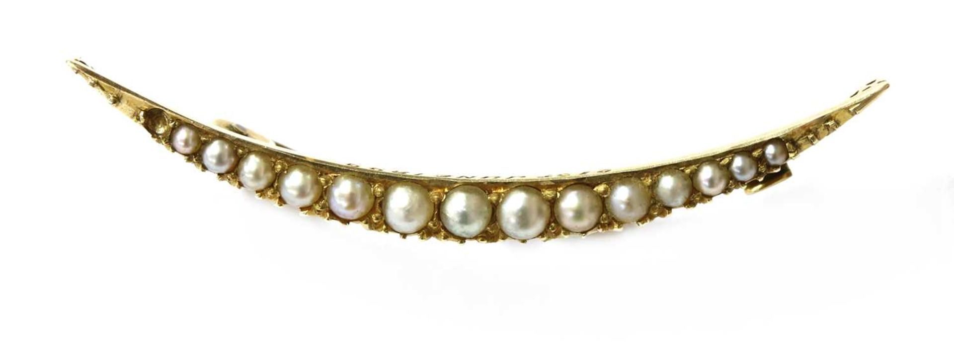 A gold split pearl open crescent brooch,