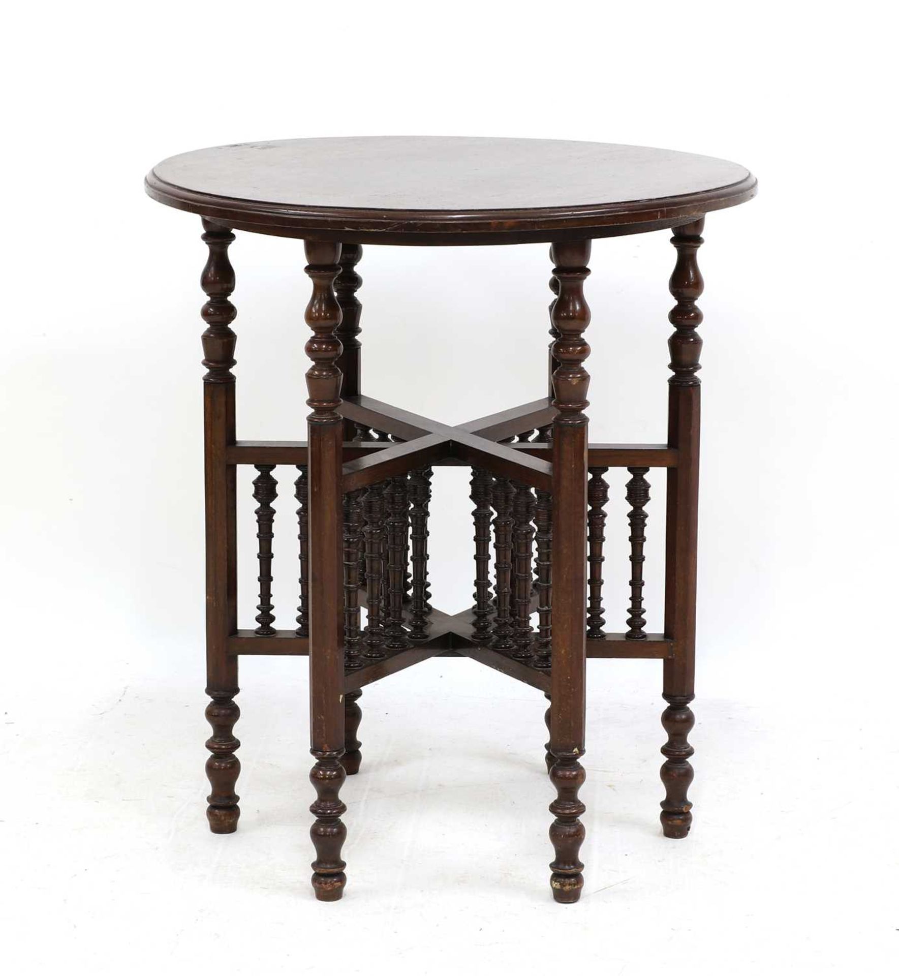A Moorish-style mahogany occasional table,