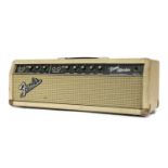 A 1964 Fender Band-Master guitar amplifier,