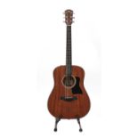 A 2014 Taylor 320e SLTD Baritone electro acoustic guitar,