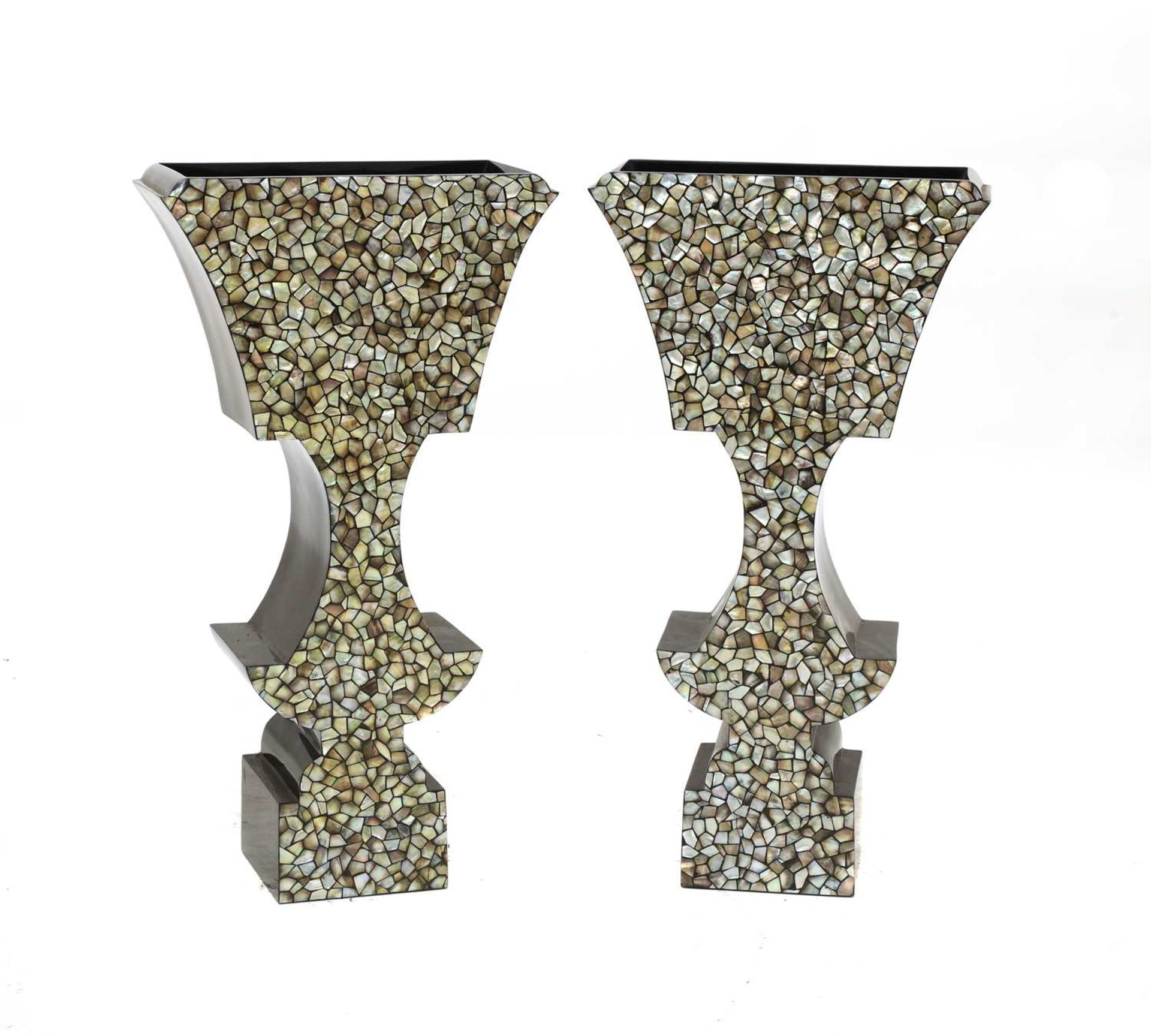 A pair of ebonised and faux mother-of-pearl planters,