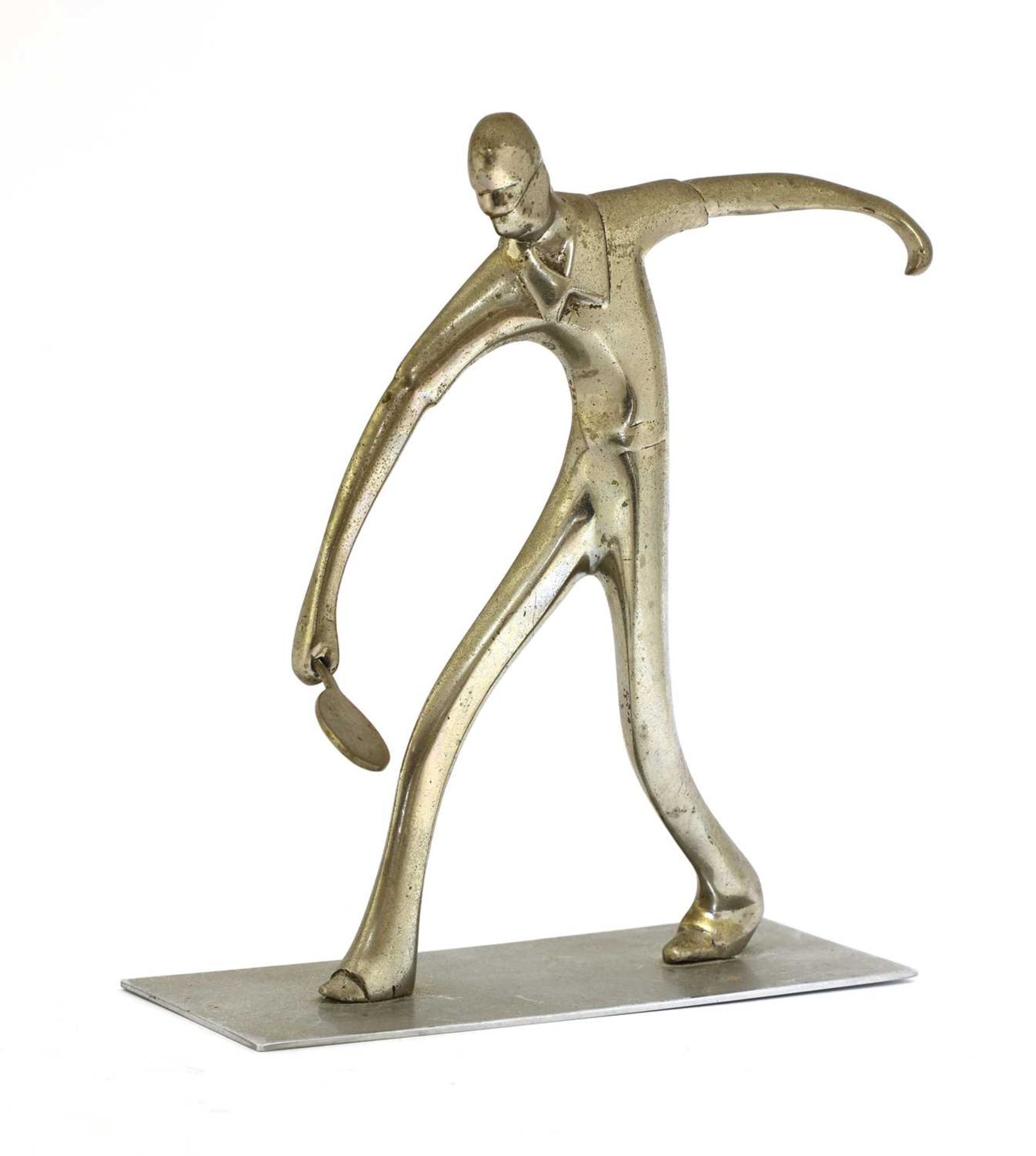 A Hagenauer silvered figure of a tennis player,