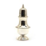 A silver sugar caster,