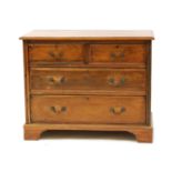 An Edwardian walnut chest of drawers,