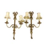 A pair of twin branch wall lights,