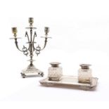 A silver ink stand with two cut glass ink wells,