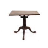 A square mahogany tripod table,