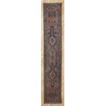 A Persian wool runner,