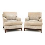 A pair of contemporary Baker lounge chairs,