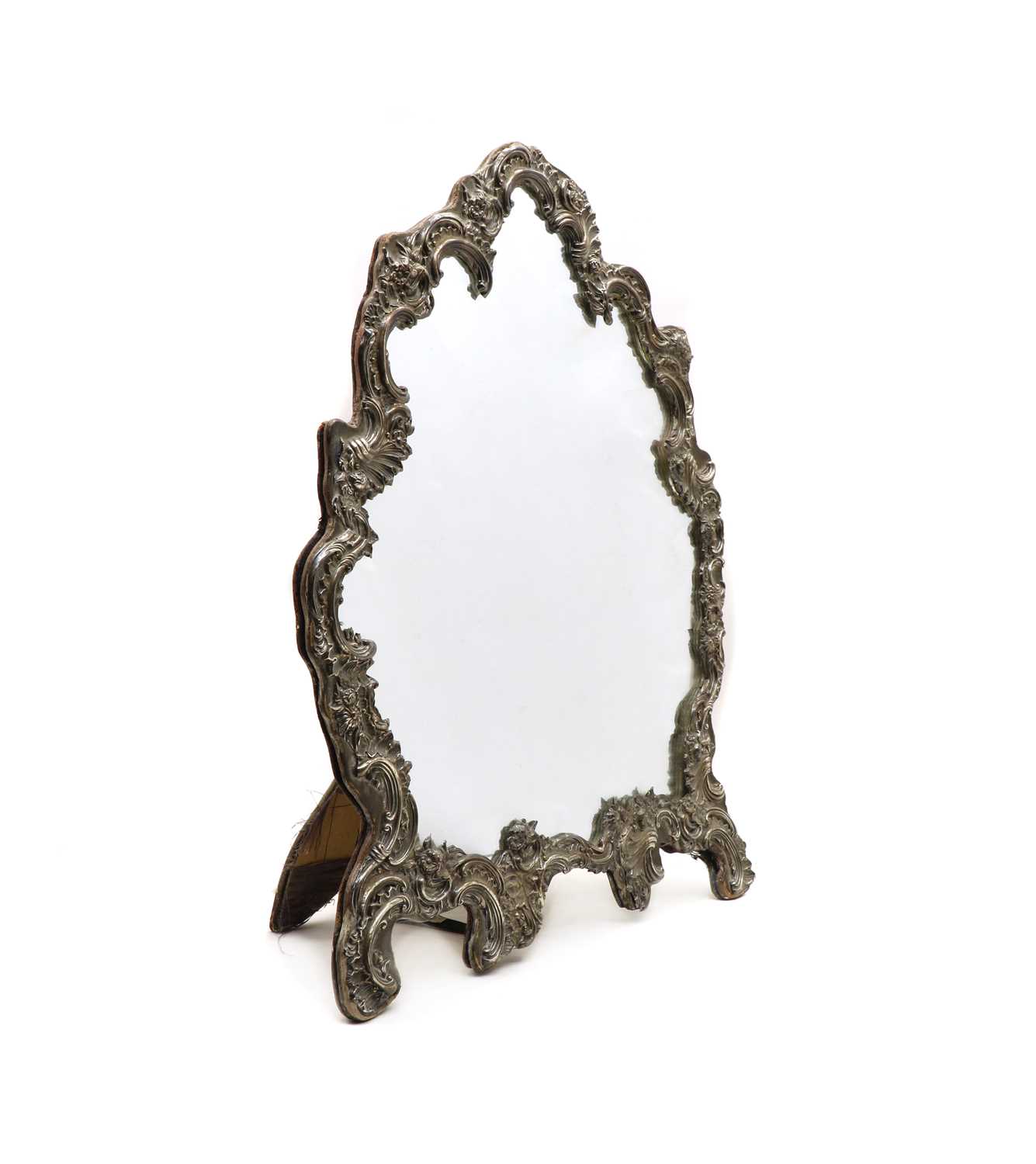 A Victorian silver dressing table mirror by William Comyns,