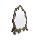 A Victorian silver dressing table mirror by William Comyns,