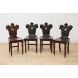 A set of four Victorian hall chairs,