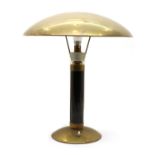 A mid century modernist brass table lamp