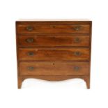 A George III mahogany chest of drawers,