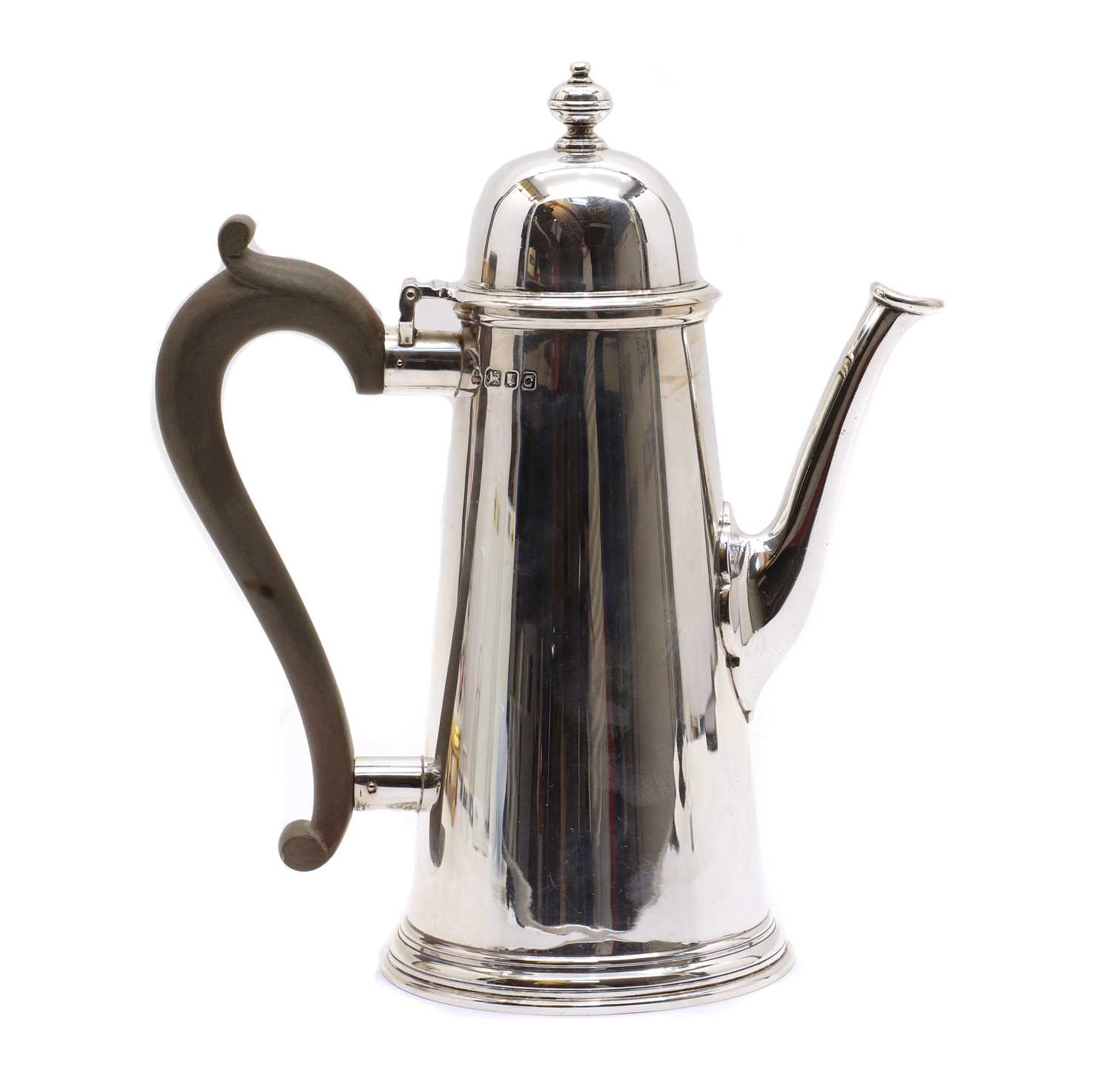 A silver coffee pot,