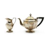 A Mappin and Webb silver teapot and cream jug,