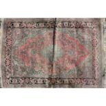 A Kerman silk rug,