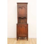 A French provincial pine and walnut cupboard,